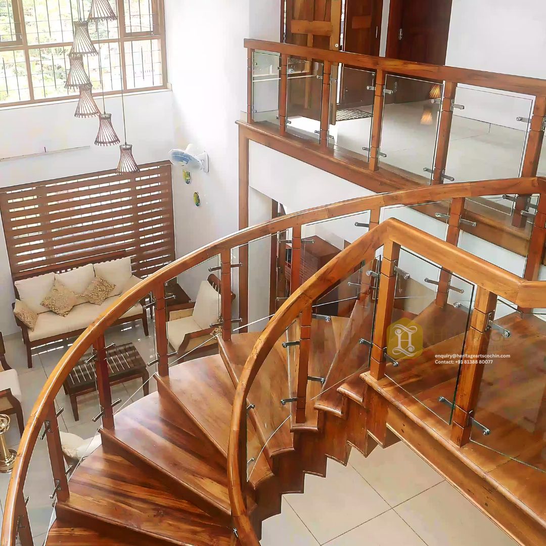 modern spiral wood and glass staircase in kerala